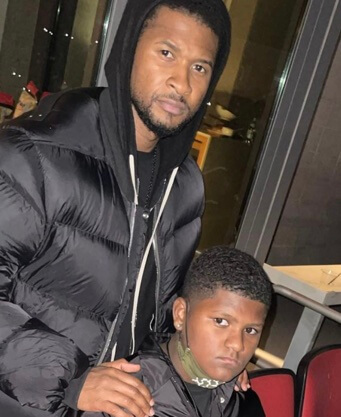 Naviyd Ely Raymond with his father, Usher Raymond.